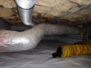 Dehumidified air being pumped into a recently remediated crawl space in West Palm Beach Florida, also moldy ducts had been cleaned in this space.