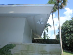 Soffit vents and soffit on a home's roof over hang area. 